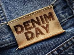 Picture of tag of jeans that says "Denim Day"